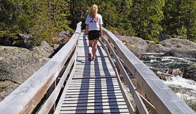 girl walking across a bridge at Mjonøy