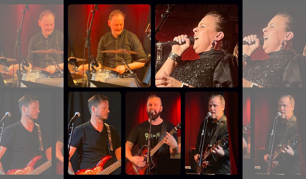 menn og dame i sorte klær, litt rød bakgrunn, gitar