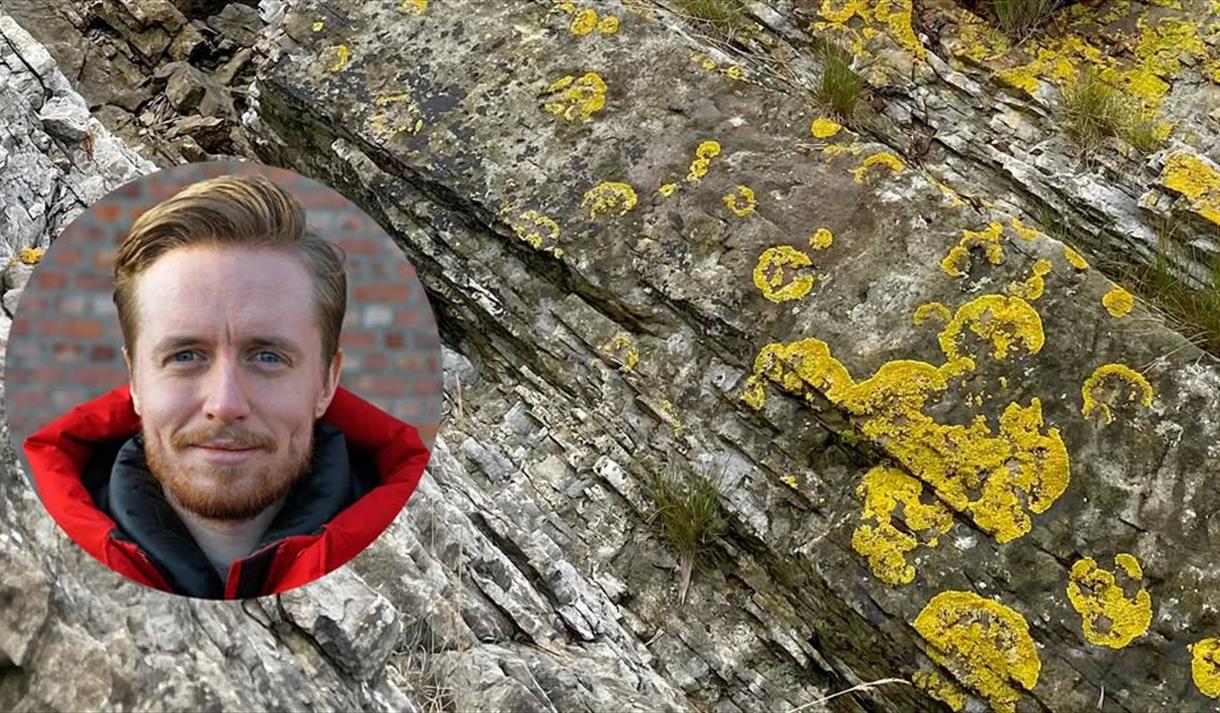 fjellformasjon med rundt bilde av en mann med skjegg