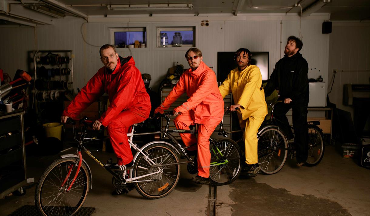 4 menn på sykler