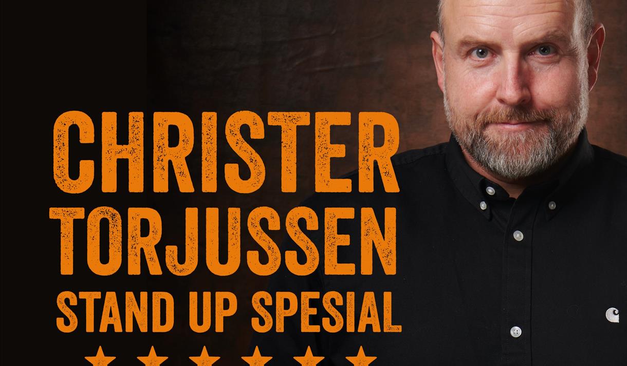 sort plakat med et bilde av en mann med skjegg. hvit og orange tekst